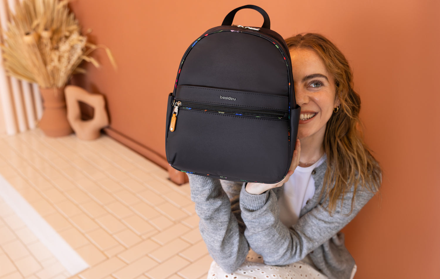 BNUFL2407-1D4 Nurture Black Orchard Backpack Model Close